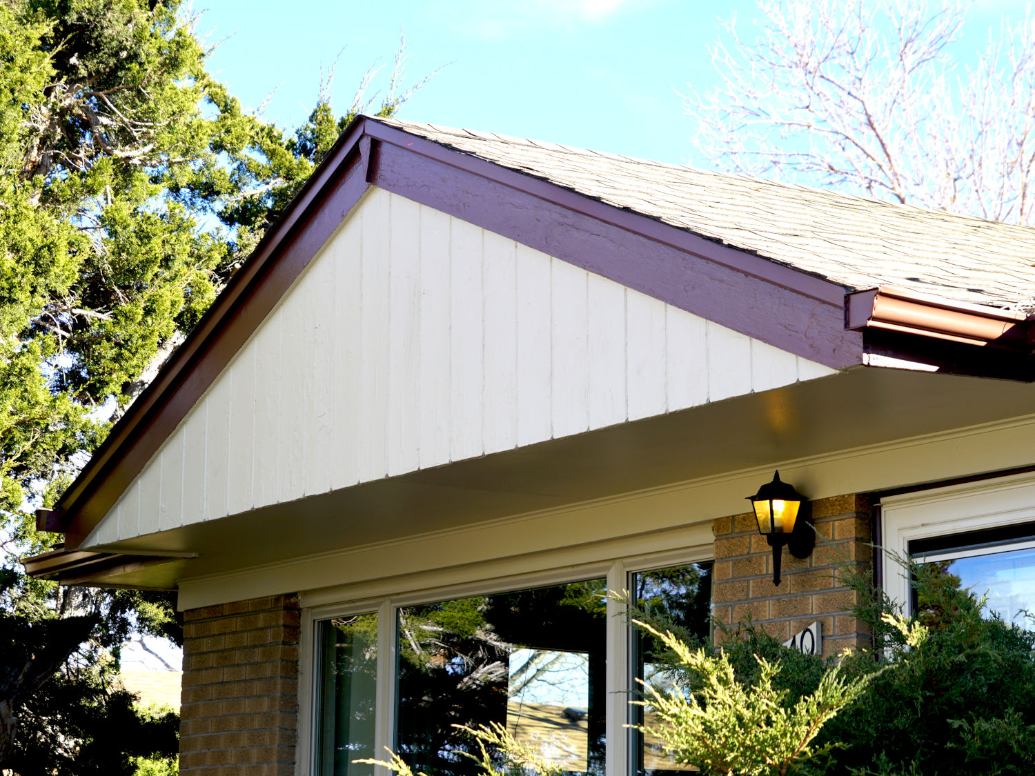 This photo shows the area above the front door after it was painted by Excellent Painters