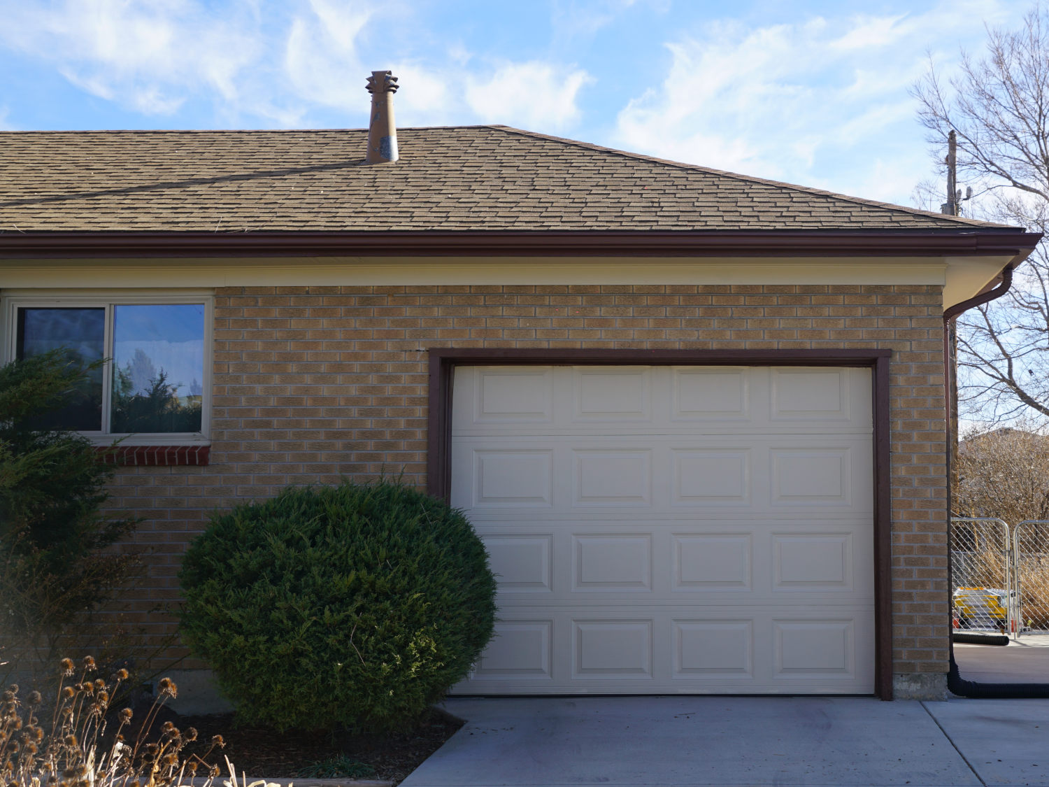 His photo shows the garage door after it was painted by Excellent Painters