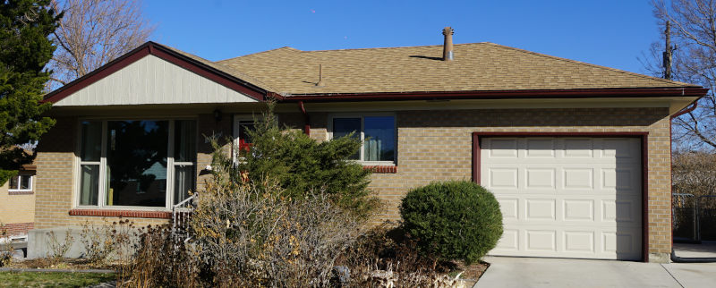 brick house re-painted trim by Excellent Painters