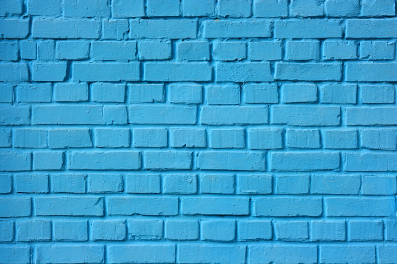 brick wall painted blue