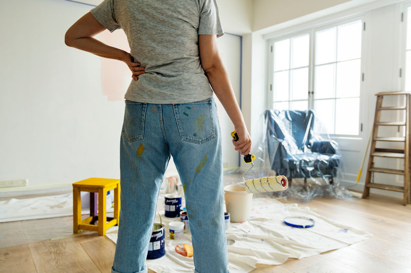 woman about to paint her home